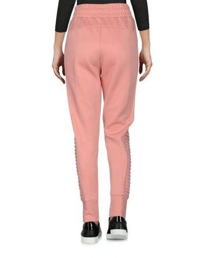 Shop Puma Casual Pants In Pink