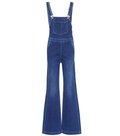 Shop Frame Palazzo Denim Overalls In Blue