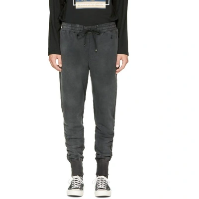 Shop Miharayasuhiro Black Damaged Track Pants