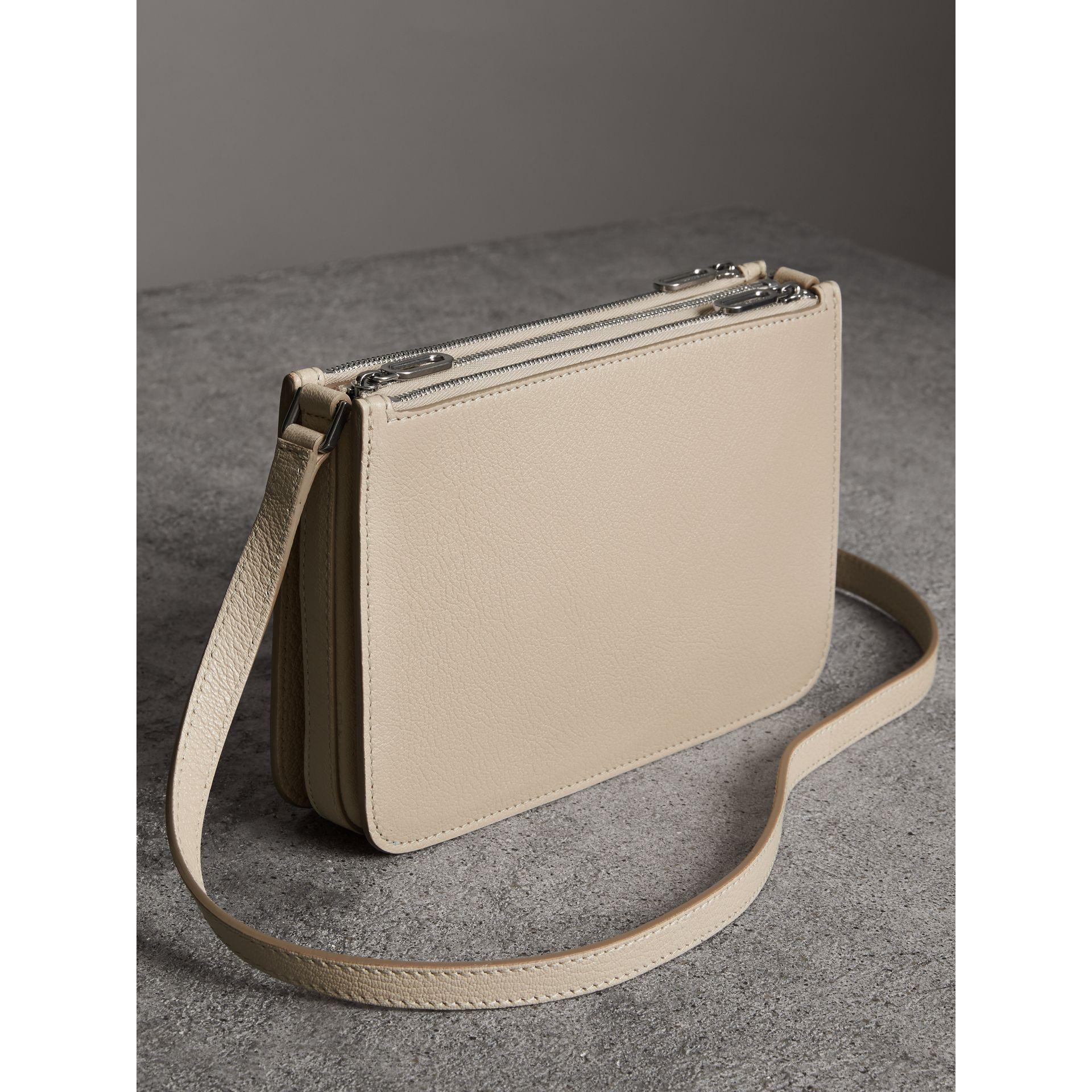 triple zip grainy leather crossbody bag