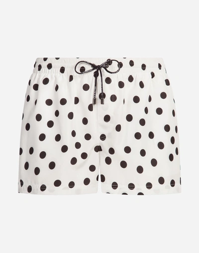 Shop Dolce & Gabbana Short Swimming Trunks With Dots Print And Pouch Bag In White