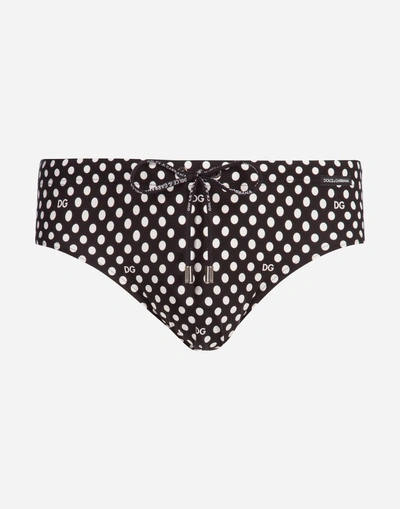 Shop Dolce & Gabbana Swimming Briefs With Dg Dots With Pouch Bag In Black