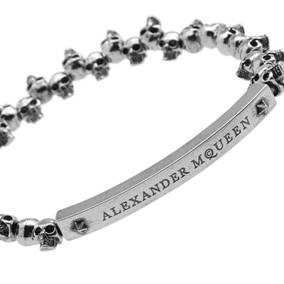 Shop Alexander Mcqueen Mini Skull Bracelet In Silver