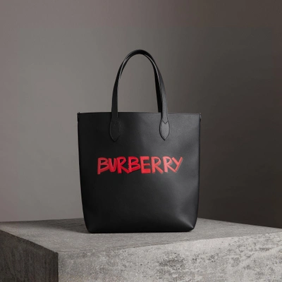 Shop Burberry Graffiti Print Bonded Leather Tote In Black