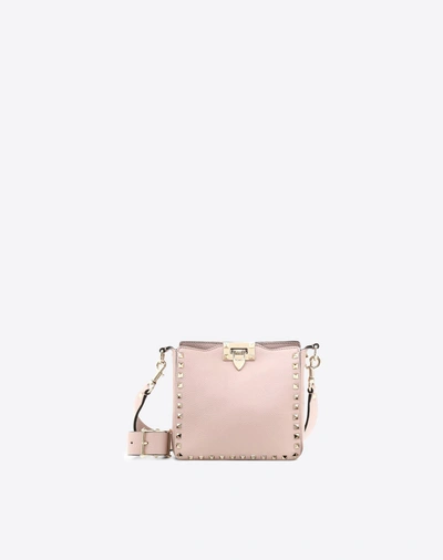 Shop Valentino Garavani Mini Rockstud Grainy Calfskin Hobo Bag In Poudre