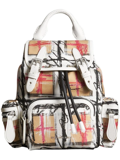 Shop Burberry The Small Crossbody Rucksack In Scribble Check In White