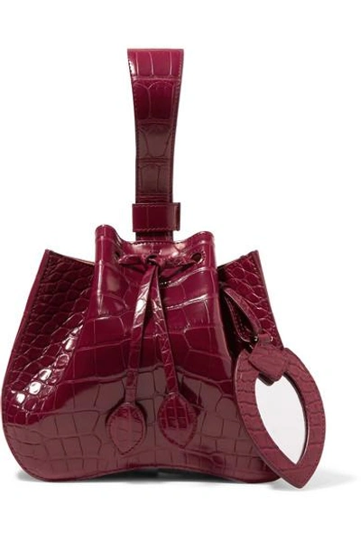 Shop Alaïa Rose Marie Alligator Bucket Bag