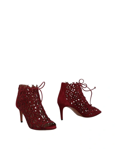 Shop Alaïa Ankle Boots In Maroon