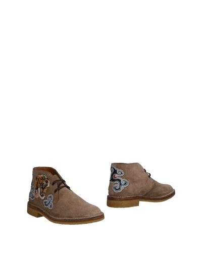 Shop Gucci Boots In Khaki