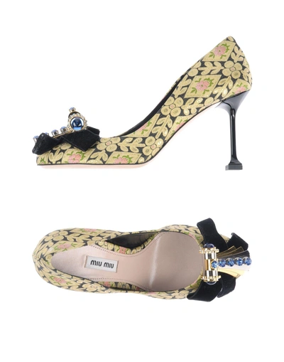 Shop Miu Miu Pump In Gold