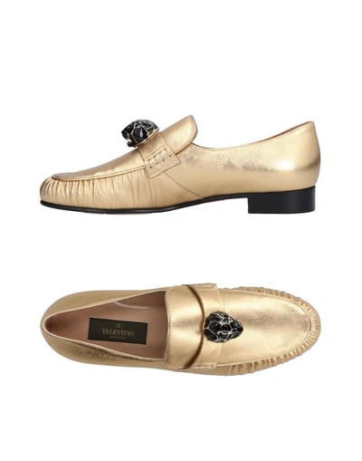 Shop Valentino Loafers In Gold