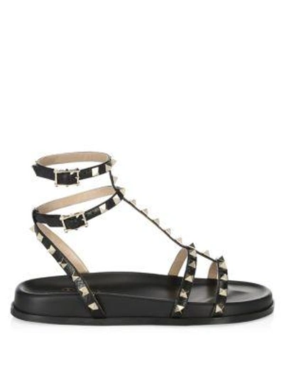 Shop Valentino Rockstud Gladiator Sandals In Black