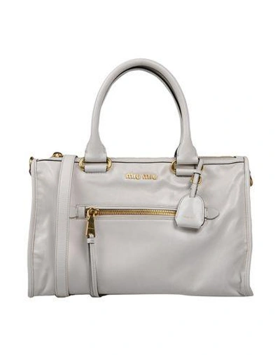 Shop Miu Miu Handbags In White