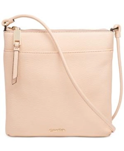 Shop Calvin Klein Pebble Crossbody In Intimate/gold