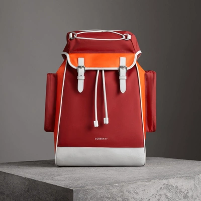 Shop Burberry Tri-tone Nylon And Leather Backpack In Parade Red