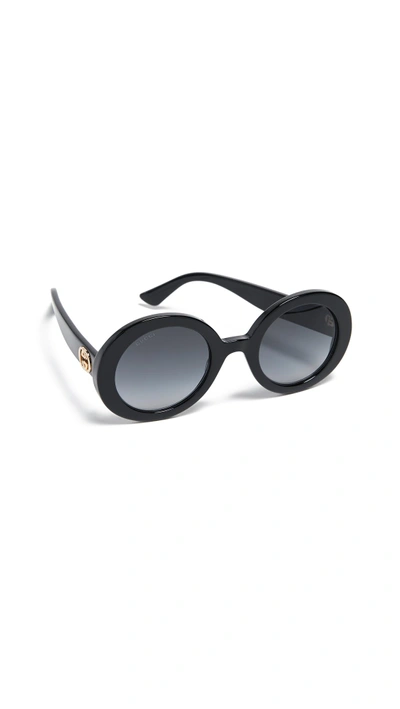 Shop Gucci Gg Oval Sunglasses In Black/gradient Grey