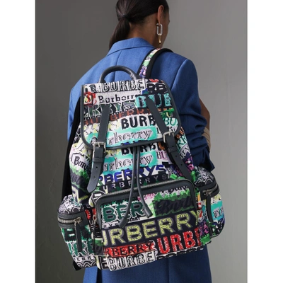 Shop Burberry The Large Rucksack In Tag Print In Yellow