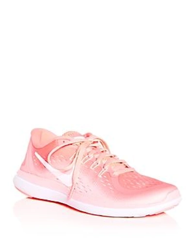 Shop Nike Women's Flex Lace Up Sneakers In Sunset Pulse/arctic Punch