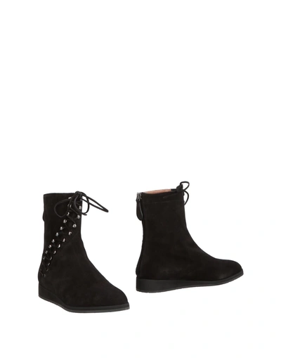 Shop Alaïa Ankle Boot In Black