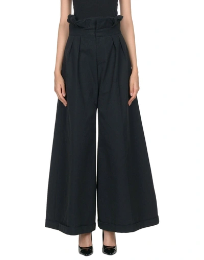 Shop Aganovich Pants In Black