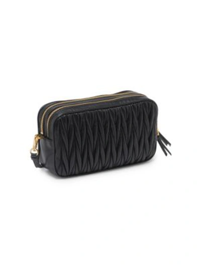 Shop Miu Miu Matelasse Leather Double-zip Crossbody Bag In Cammeo