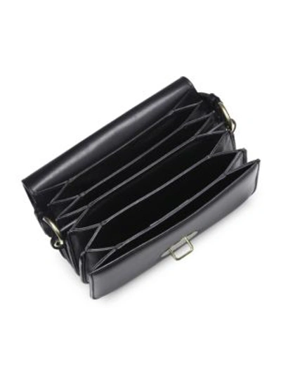Shop Calvin Klein Small Round Leather Lock Shoulder Bag In Black