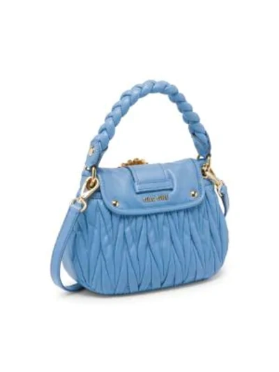 Shop Miu Miu Matelasse Leather Top Handle Bag In Orchidea