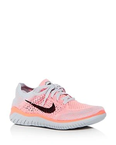 Shop Nike Women's Free Rn Flyknit 2018 Lace Up Sneakers In Crimson Pulse Pink/black