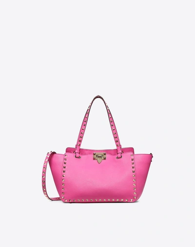 Shop Valentino Small Rockstud Bag In Pink