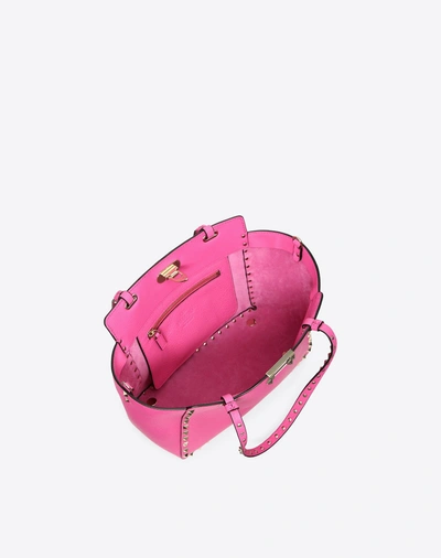 Shop Valentino Small Rockstud Bag In Pink