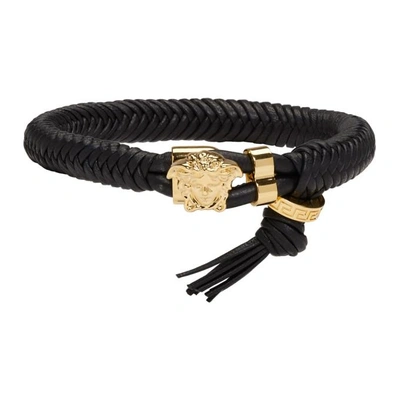 Shop Versace Black And Gold Leather Braid Bracelet In D41oh Black