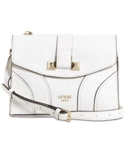 Shop Guess Islington Flap Crossbody In White/gold