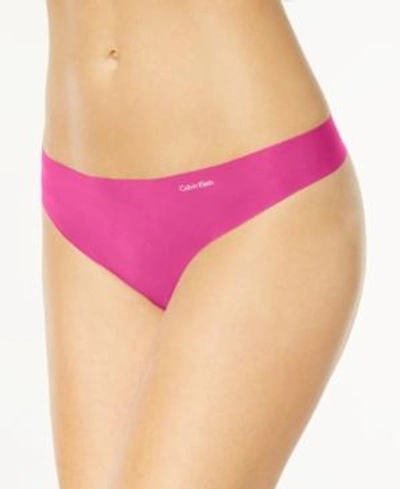 Shop Calvin Klein Invisibles Thong D3428 In Sophie Pink