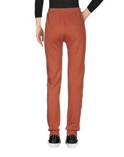 Shop Happiness Casual Pants In Rust