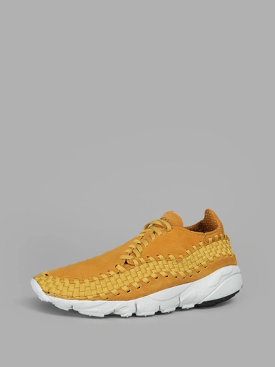 Shop Nike Men's Orange Air Footscape Woven