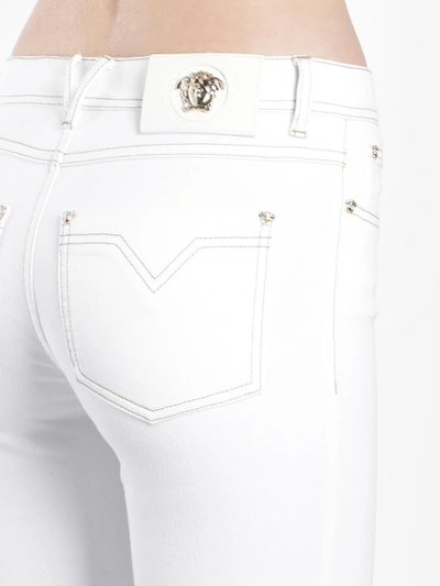 Shop Versace White Jeans