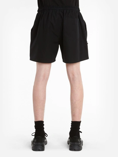 Shop Raf Simons ' Men's Black Drawstring Shorts With Tape Detail