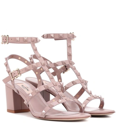 Shop Valentino Rockstud Leather Sandals In Pink