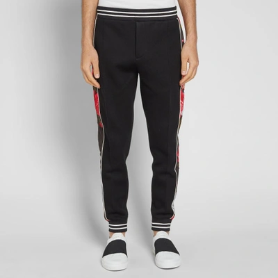 Shop Alexander Mcqueen Floral Taped Jogger In Black