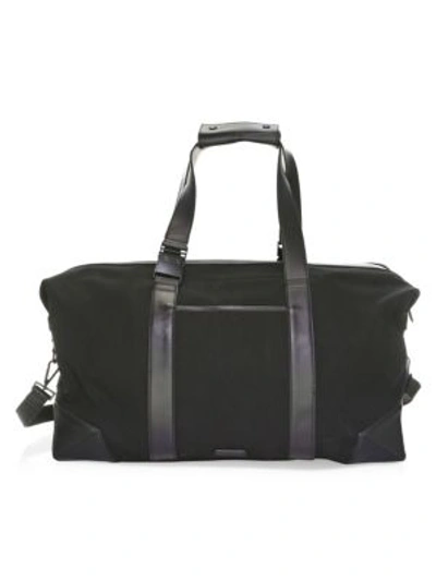Shop Uri Minkoff Waverley Nylon Weekender Bag In Black