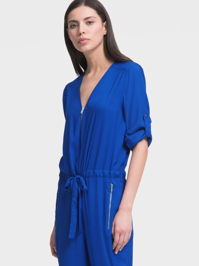Shop Donna Karan V-neck Jumpsuit With Drawstring Waist In Ink Blue