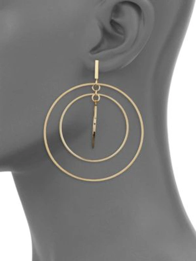 Shop Tory Burch Statement Triple Hoops In Yellow Gold