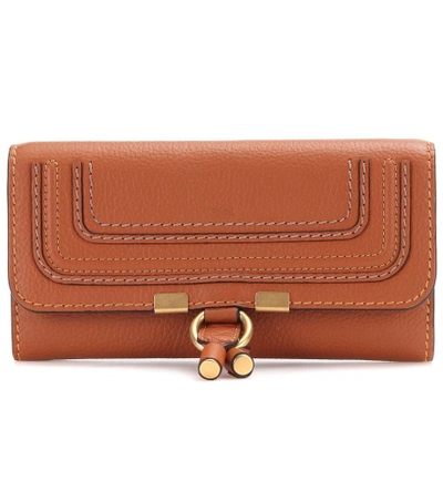Shop Chloé Marcie Flap-over Leather Wallet In Brown
