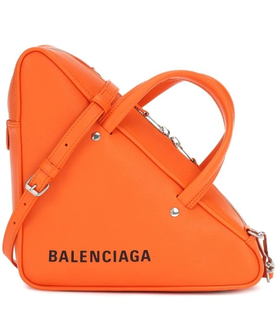 Shop Balenciaga Triangle Duffle Leather Tote In Orange