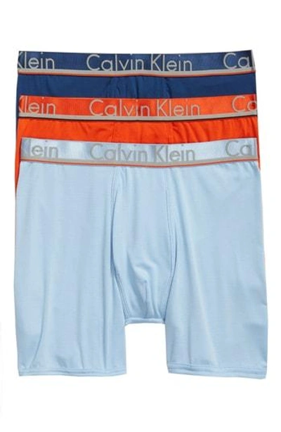 Shop Calvin Klein 3-pack Comfort Microfiber Boxer Briefs In Rapid Blue/ Blue/ Oriole