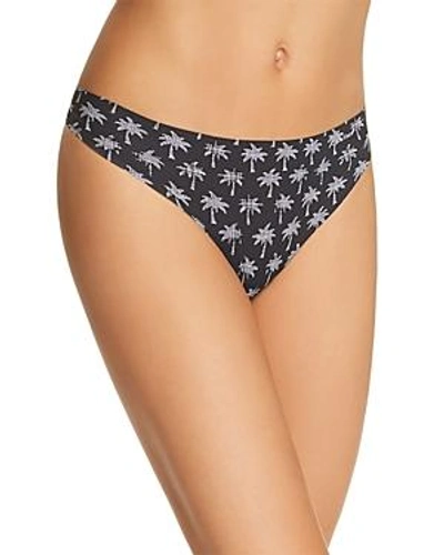 Shop Calvin Klein Invisibles Thong In Charcoal/fools Paradise
