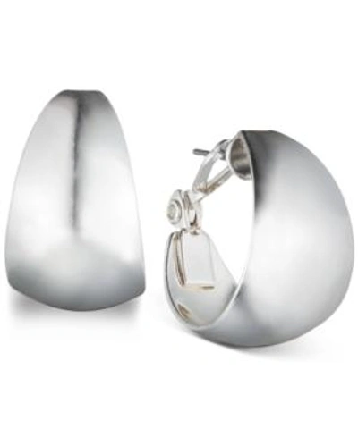Shop Anne Klein 3/4" Medium Band Small Hoop Earrings In Silver