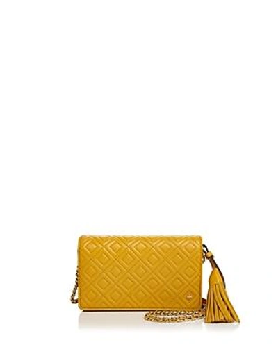 Shop Tory Burch Fleming Flat Leather Wallet Bag In Day Lily Yellow/gold