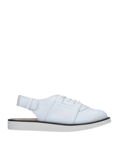 Shop Reebok Lace-up Shoes In White