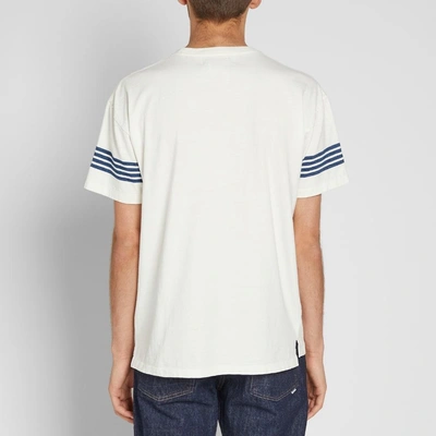 Shop Remi Relief Four Stripe Sleeve Pocket Tee In White